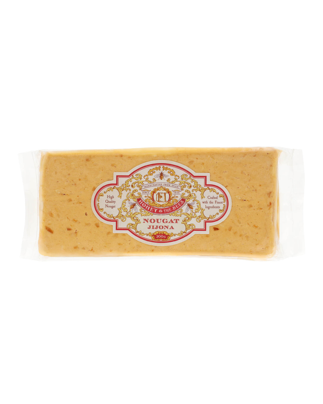 Jijona-nougat – blød, spansk nougat med mandler og appelsinblomsthonning.

Forkæl dig selv med ægte turrón de Jijona – den silkebløde søster til den klassiske, sprøde Alicante-variant. Denne luksuriøse spanske mandelnougat er fremstillet i byen Jijona, hvor nougathåndværket har været en stolt tradition i generationer.

Her kombineres friskristede mandler med naturlig appelsinblomsthonning, sukker og et strejf af varme – en opskrift, der giver en cremet, rig og floral smag. 
