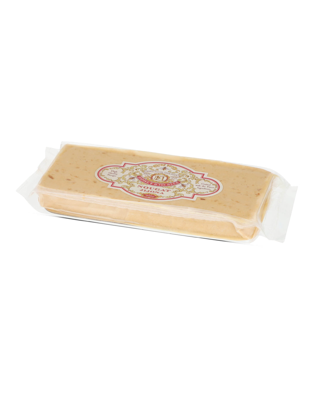 Jijona-nougat – blød, spansk nougat med mandler og appelsinblomsthonning.

Forkæl dig selv med ægte turrón de Jijona – den silkebløde søster til den klassiske, sprøde Alicante-variant. Denne luksuriøse spanske mandelnougat er fremstillet i byen Jijona, hvor nougathåndværket har været en stolt tradition i generationer.

Her kombineres friskristede mandler med naturlig appelsinblomsthonning, sukker og et strejf af varme – en opskrift, der giver en cremet, rig og floral smag. 